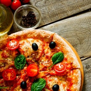 tasty-pizza-tomatoes-and-others-ingredients-QCXLL3W.jpg